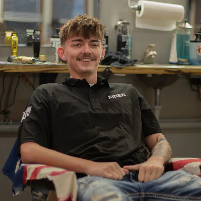 Aidan McGee, barber at The Greenfield Barbershop