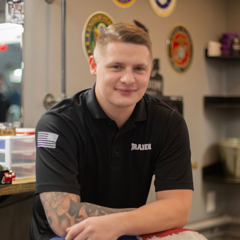 Braden Elmer, barber at The Greenfield Barbershop